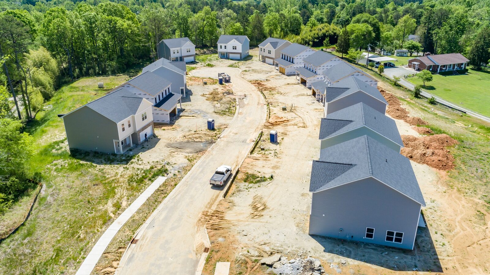 Aerial view of a workforce housing community under construction